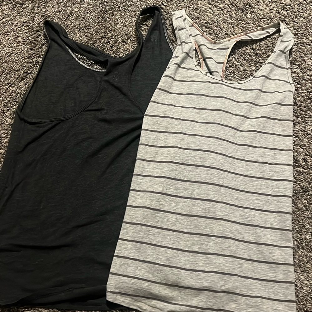 TWO lululemon racerback tanks luon fabric size 6 form fitting.